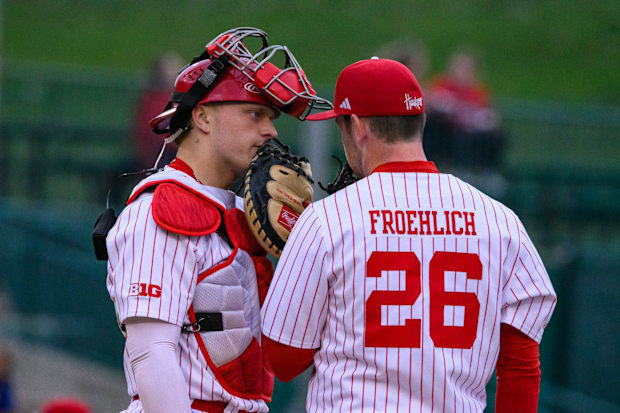 Catcher Josh Caron chats with Kyle Froehlich during a mound visit. 