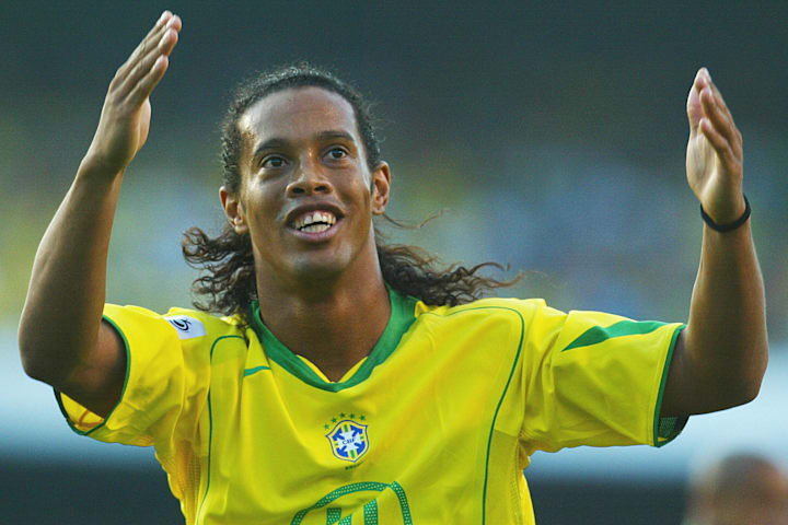 Brazilian Ronaldinho Gaucho celebrates h