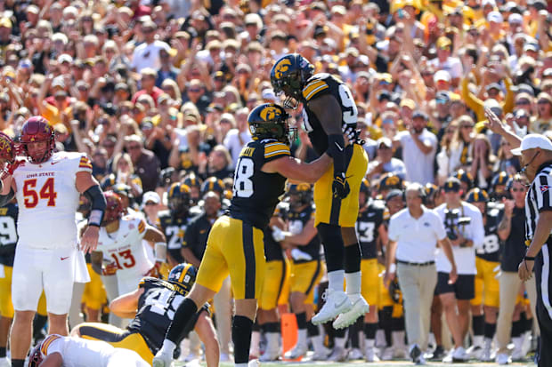 Iowa DL Max Llewellyn (left), Brian Allen. (Rob Howe/HN) 