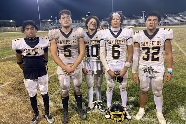 San Pedro High football players after a big win over Granada Hills Kennedy High in Week 1 of the 2024 season.