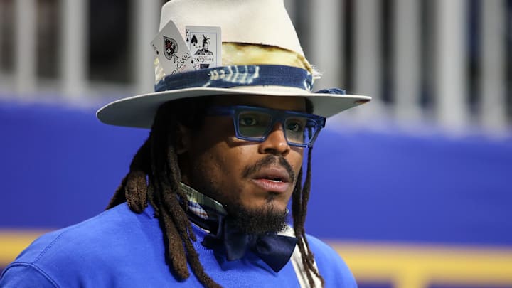Dec 16, 2023; Atlanta, GA, USA; Former NFL quarterback Cam Newton watches a game between the Howard Bison and Florida A&M Rattlers in the first half at Mercedes-Benz Stadium. Mandatory Credit: Brett Davis-Imagn Images