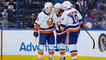 Feb 1, 2025; Tampa, Florida, USA; New York Islanders defenseman Adam Boqvist (34) celebrates after scoring a goal against the Tampa Bay Lightning in the second period at Amalie Arena. Mandatory Credit: Nathan Ray Seebeck-Imagn Images