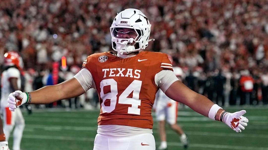 Sep 20, 2025; Austin, Texas, USA; Texas Longhorns tight end Jordan Washington (84) reacts after scoring a touchdown during the first half against the Sam Houston Bearkats at Darrell K Royal-Texas Memorial Stadium. Mandatory Credit: Scott Wachter-Imagn Images
