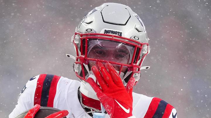 Jan 25, 2026; Denver, CO, USA; New England Patriots cornerback Christian Gonzalez (0) reacts after an interception against the Denver Broncos  during the second half in the 2026 AFC Championship Game at Empower Field at Mile High. Mandatory Credit: Ron Chenoy-Imagn Images