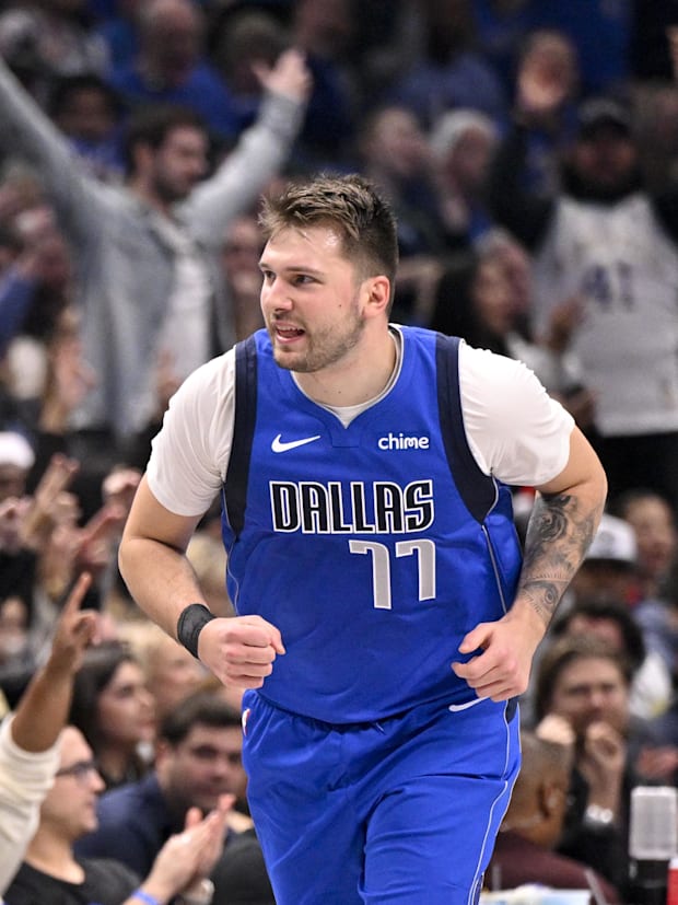 Dallas Mavericks guard Luka Doncic celebrates after making a basket against the Minnesota Timberwolves