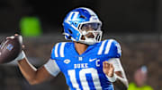 Aug 28, 2025; Durham, North Carolina, USA;  Duke Blue Devils quarterback Darian Mensah (10) goes to throw the ball against the Elon Phoenix during the first half at Wallace Wade Stadium. Mandatory Credit: James Guillory-Imagn Images