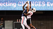 Nov 15, 2024; Tucson, Arizona, USA; Arizona Wildcats wide receiver Tetairoa McMillan (4) catches the ball to make a touchdown during the first quarter against the Houston Cougars at Arizona Stadium. Mandatory Credit: Aryanna Frank-Imagn Images