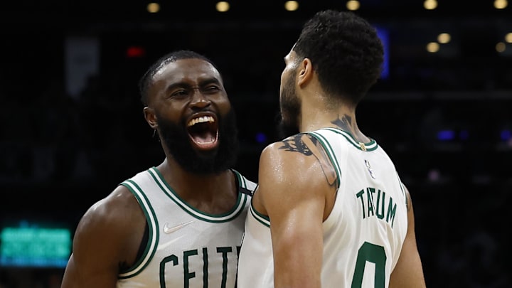 May 15, 2022; Boston, Massachusetts, USA; Boston Celtics guard Jaylen Brown (7) and forward Jayson Tatum (0) celebrate during the second half of their win over the Milwaukee Bucks in game seven of the second round of the 2022 NBA playoffs at TD Garden. Mandatory Credit: Winslow Townson-Imagn Images