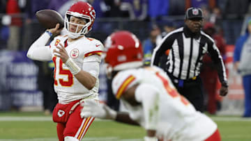 Kansas City Chiefs quarterback Patrick Mahomes (15) passes the ball to Chiefs wide receiver Rashee Rice (4) against the Baltimore Ravens in the AFC Championship football game at M&T Bank Stadium.