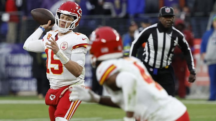 Kansas City Chiefs quarterback Patrick Mahomes (15) passes the ball to Chiefs wide receiver Rashee Rice (4) against the Baltimore Ravens in the AFC Championship football game at M&T Bank Stadium.