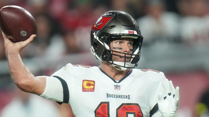 Tampa Bay Buccaneers quarterback Tom Brady (12) throws the ball against the Arizona Cardinals at State Farm Stadium in Glendale on Dec. 25, 2022.