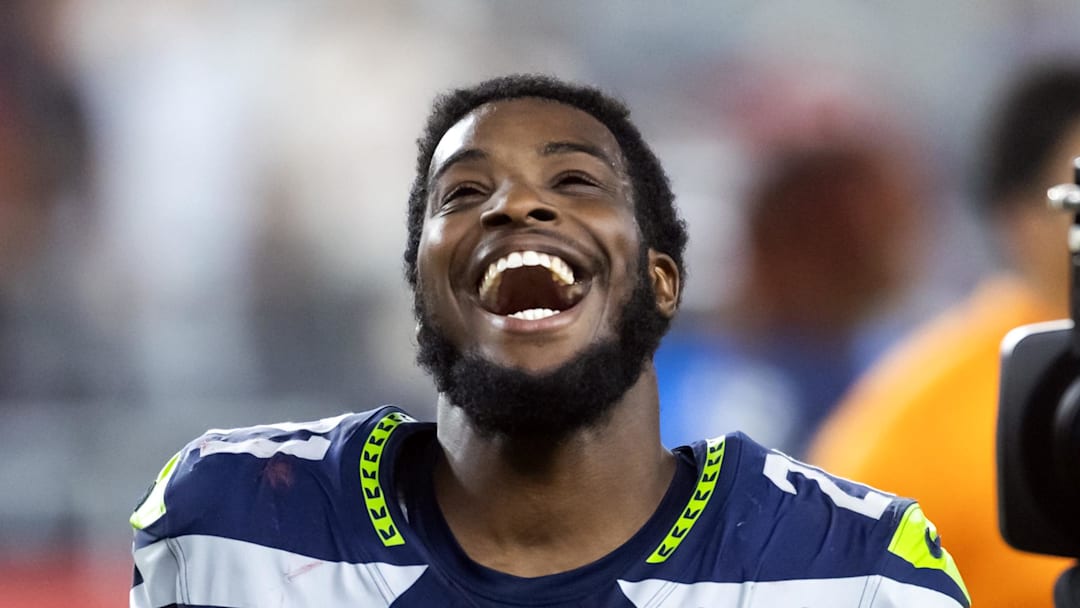 Sep 25, 2025; Glendale, Arizona, USA; Seattle Seahawks cornerback Devon Witherspoon (21) against the Arizona Cardinals at State Farm Stadium. Mandatory Credit: Mark J. Rebilas-Imagn Images