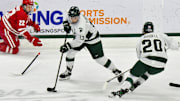 Michigan State's Tiernan Shoudy (13) looks to pass against Wisconsin at Munn Arena Saturday, Nov. 22, 2025.