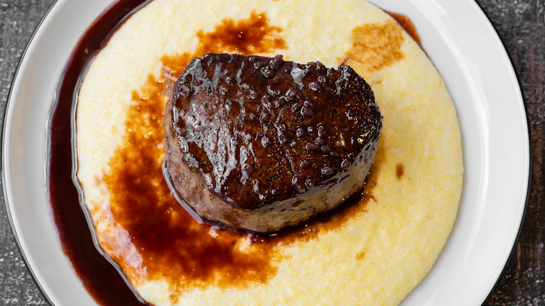 Pan seared filet mignon with red wine and pomegranate pan sauce