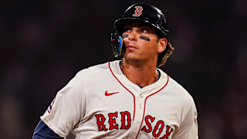 Boston Red Sox first baseman Triston Casas (36) hits a three-run home run against the Seattle Mariners in the seventh inning at Fenway Park.