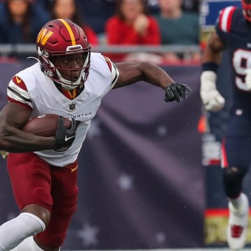 Nov 5, 2023; Foxborough, Massachusetts, USA; Washington Commanders receiver Byron Pringle (3) runs after a catch during the first half against the New England Patriots at Gillette Stadium. Mandatory Credit: Paul Rutherford-USA TODAY Sports