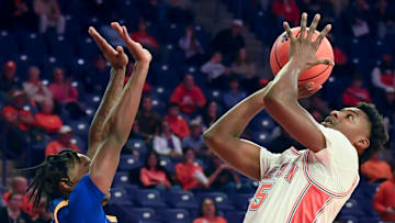 Morehead State Eagles guard Chase Dawson (10) defends the shot of Clemson Tigers guard Zac Foster (5) Tuesday, Nov. 11, 2025, during the NCAA men’s basketball game at Littlejohn Coliseum in Clemson, South Carolina.
