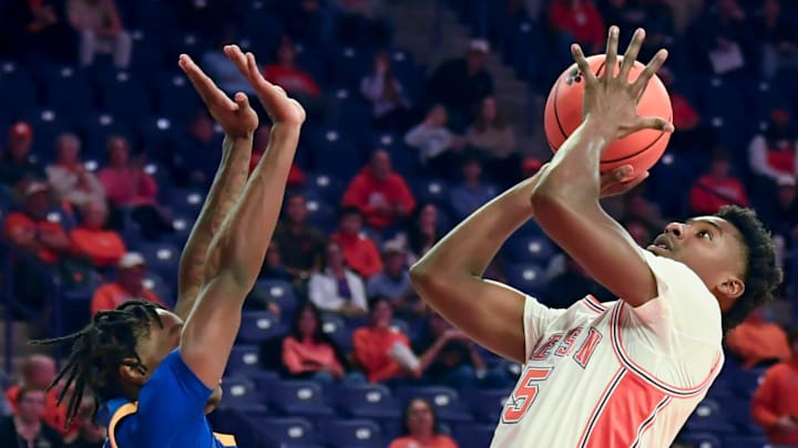 Morehead State Eagles guard Chase Dawson (10) defends the shot of Clemson Tigers guard Zac Foster (5) Tuesday, Nov. 11, 2025, during the NCAA men’s basketball game at Littlejohn Coliseum in Clemson, South Carolina.