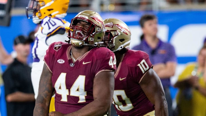 Florida State Seminoles defensive lineman Joshua Farmer (44) celebrates a sack during a game against the LSU Tigers on Sunday, Sept. 3, 2023.