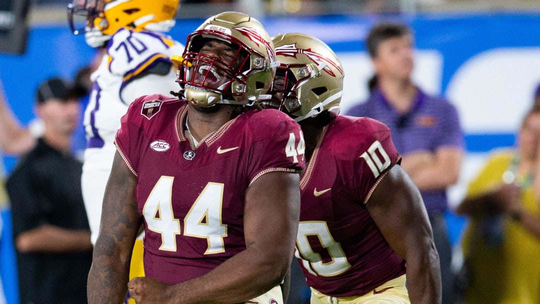 Florida State Seminoles defensive lineman Joshua Farmer (44) celebrates a sack during a game against the LSU Tigers on Sunday, Sept. 3, 2023.