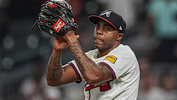 Sep 23, 2025; Cumberland, Georgia, USA; Atlanta Braves relief pitcher Raisel Iglesias (26)  reacts after the Braves defeated the Washington Nationals at Truist Park.
