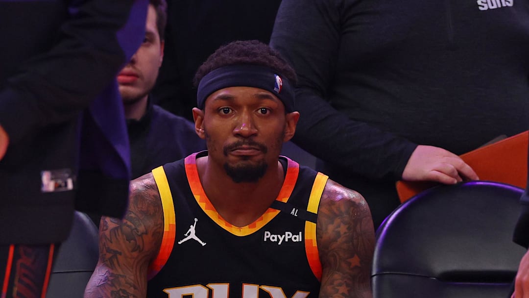 Apr 9, 2025; Bradley Beal watches from the bench as Phoenix take on the  Oklahoma City Thunder at Footprint Center. Credit: Mark J. Rebilas-Imagn Images