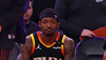 Apr 9, 2025; Bradley Beal watches from the bench as Phoenix take on the  Oklahoma City Thunder at Footprint Center. Credit: Mark J. Rebilas-Imagn Images