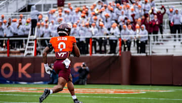 Virginia Tech receiver Cameron Seldon walks his way to a touchdown during the Hokies' spring game.