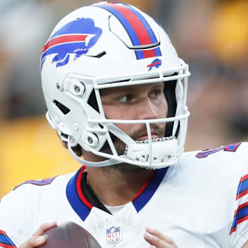 Aug 17, 2024; Pittsburgh, Pennsylvania, USA;  Buffalo Bills quarterback Josh Allen (17) warms up on the field before a game against the Pittsburgh Steelers at Acrisure Stadium. Mandatory Credit: Charles LeClaire-Imagn Images