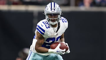 Nov 3, 2024; Atlanta, Georgia, USA; Dallas Cowboys running back Rico Dowdle (23) runs after a catch against the Atlanta Falcons in the fourth quarter at Mercedes-Benz Stadium. Mandatory Credit: Brett Davis-Imagn Images