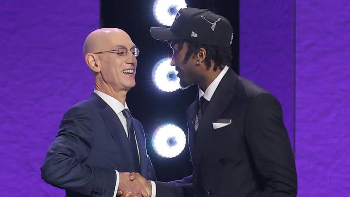 Jun 23, 2026; New York, NY, USA; NBA commissioner Adam Silver greets the second pick in the 2026 NBA draft, Kansas guard Darryn Peterson after he was selected by the Utah Jazz at Barclays Center. Mandatory Credit: Brad Penner-Imagn Images