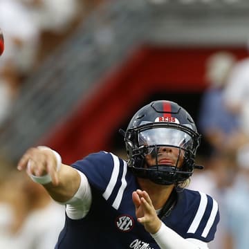 Aug 31, 2024; Oxford, Mississippi, USA; Mississippi Rebels quarterback Jaxson Dart (2) passes the ball during the first quarter against the Furman Paladins at Vaught-Hemingway Stadium. Mandatory Credit: Petre Thomas-USA TODAY Sports