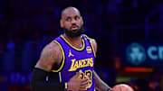 Feb 25, 2025; Los Angeles, California, USA; Los Angeles Lakers forward LeBron James (23) dribbles the ball against the Dallas Mavericks during the second half at Crypto.com Arena. Mandatory Credit: Gary A. Vasquez-Imagn Images