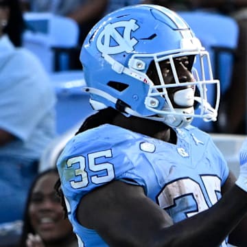 Sep 13, 2025; Chapel Hill, North Carolina, USA; North Carolina Tar Heels running back Demon June (35) celebrates after scoring a touchdown in the fourth quarter at Kenan Stadium. Mandatory Credit: Bob Donnan-Imagn Images