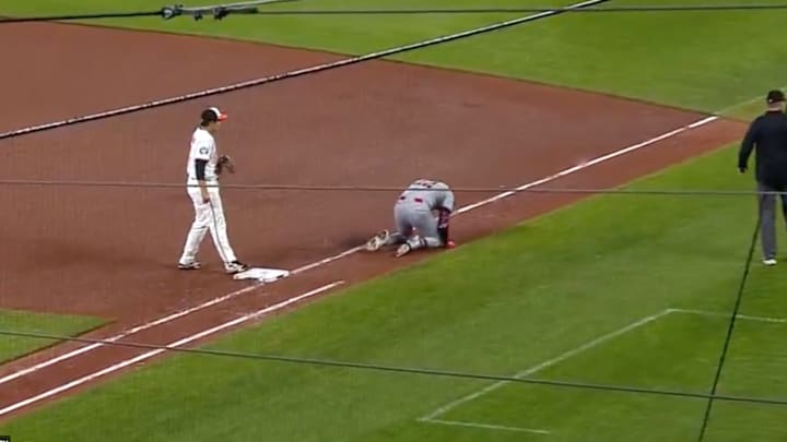 Nolan Jones reacts to getting hit with a baseball. Nolan Jones reacts to getting hit with a baseball.