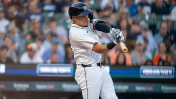 Detroit Tigers Gio Urshela (13) swings at a pitch against the Seattle Mariners at Comerica Park in Detroit on Tuesday, Aug. 13, 2024.