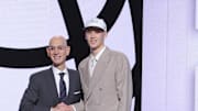Jun 25, 2025; Brooklyn, NY, USA;  Egor Demin stands with NBA commissioner Adam Silver after being selected as the eighth pick by the Brooklyn Nets in the first round of the 2025 NBA Draft at Barclays Center. Mandatory Credit: Brad Penner-Imagn Images