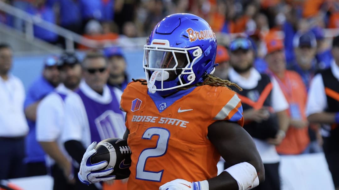 Oct 5, 2024; Boise, Idaho, USA; Boise State Broncos running back Ashton Jeanty (2) scores a touchdown during the first half against the Utah State Aggies at Albertsons Stadium. Mandatory Credit: Brian Losness-Imagn Images

