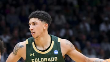 Mar 23, 2025; Seattle, WA, USA; Colorado State Rams guard Nique Clifford (10) dribbles the ball against Maryland Terrapins guard Ja'Kobi Gillespie (0) and forward Julian Reese (10) in the second half at Climate Pledge Arena. Mandatory Credit: Steven Bisig-Imagn Images