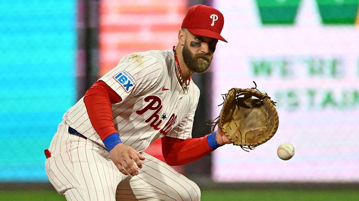 Sep 8, 2025; Philadelphia, Pennsylvania, USA; Philadelphia Phillies first base Bryce Harper (3) fields a ground ball during the fourth inning against the New York Mets at Citizens Bank Park.