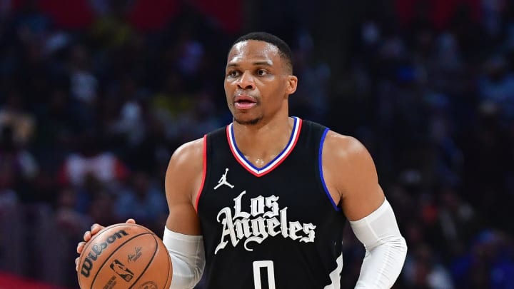 Dec 16, 2023; Los Angeles, California, USA; Los Angeles Clippers guard Russell Westbrook (0) controls the ball against the New York Knicks during the first half at Crypto.com Arena. Mandatory Credit: Gary A. Vasquez-USA TODAY Sports
