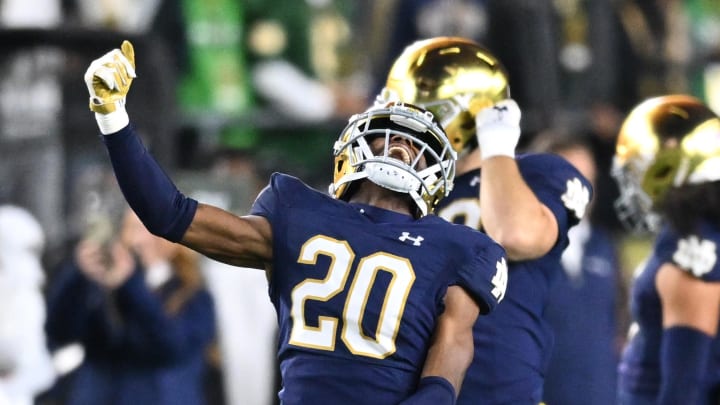 Oct 14, 2023; South Bend, Indiana, USA; Notre Dame Fighting Irish cornerback Benjamin Morrison (20) celebrates after an interception in the second quarter against the USC Trojans at Notre Dame Stadium. Mandatory Credit: Matt Cashore-USA TODAY Sports