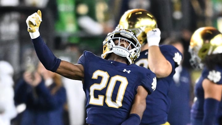 Oct 14, 2023; South Bend, Indiana, USA; Notre Dame Fighting Irish cornerback Benjamin Morrison (20) celebrates after an interception in the second quarter against the USC Trojans at Notre Dame Stadium. Mandatory Credit: Matt Cashore-Imagn Images