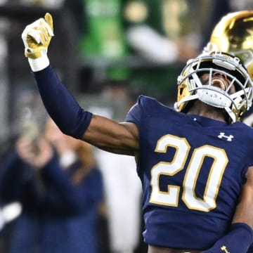 Oct 14, 2023; South Bend, Indiana, USA; Notre Dame Fighting Irish cornerback Benjamin Morrison (20) celebrates after an interception in the second quarter against the USC Trojans at Notre Dame Stadium.