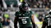 Michigan State's Jordan Hall celebrates after a stop against Michigan during the second quarter on Saturday, Oct. 25, 2025, at Spartan Stadium in East Lansing.