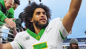 Oregon quarterback Dante Moore celebrates after the game as the Oregon Ducks take on the Washington Huskies on Nov. 29, 2025, at Husky Stadium in Seattle, Washington.