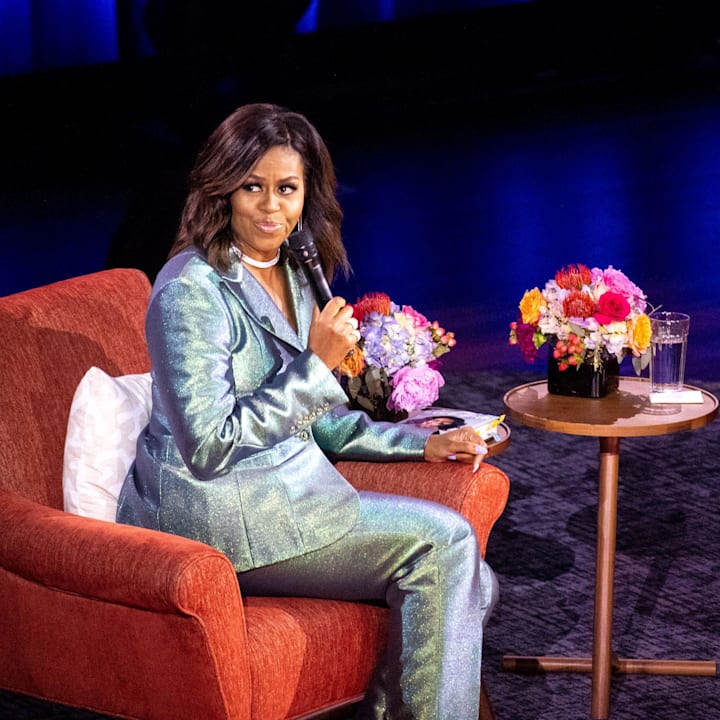 Michelle Obama speaks with Stephen Colbert during her Becoming: An Intimate Conversation with Michelle Obama event 