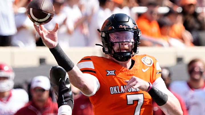 Oklahoma State's Alan Bowman (7) throws a pass in the first half of the college football game between the Oklahoma State Cowboys and the Arkansas Razorbacks at Boone Pickens Stadium in Stillwater, Okla.,, Saturday, Sept., 7, 2024.