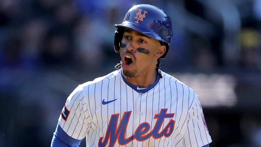 Mar 29, 2026; New York City, New York, USA; New York Mets shortstop Francisco Lindor (12) reacts after drawing a walk during the tenth inning against the Pittsburgh Pirates at Citi Field. Mandatory Credit: Brad Penner-Imagn Images
