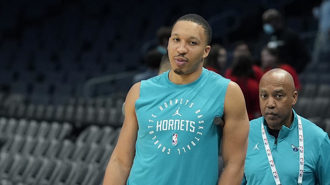 Jan 29, 2025; Charlotte, North Carolina, USA; Charlotte Hornets forward Grant Williams (2), who is recovering from his ACL repair, is seen during pre game warm ups against the Brooklyn Nets at Spectrum Center. Mandatory Credit: Jim Dedmon-Imagn Images Jan 29, 2025; Charlotte, North Carolina, USA; Charlotte Hornets forward Grant Williams (2), who is recovering from his ACL repair, is seen during pre game warm ups against the Brooklyn Nets at Spectrum Center. Mandatory Credit: Jim Dedmon-Imagn Images